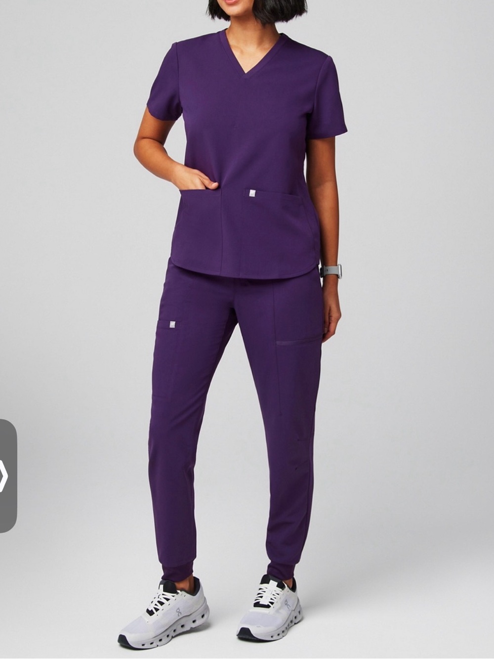 Fabletics woman’s Deep Purple scrubs set
